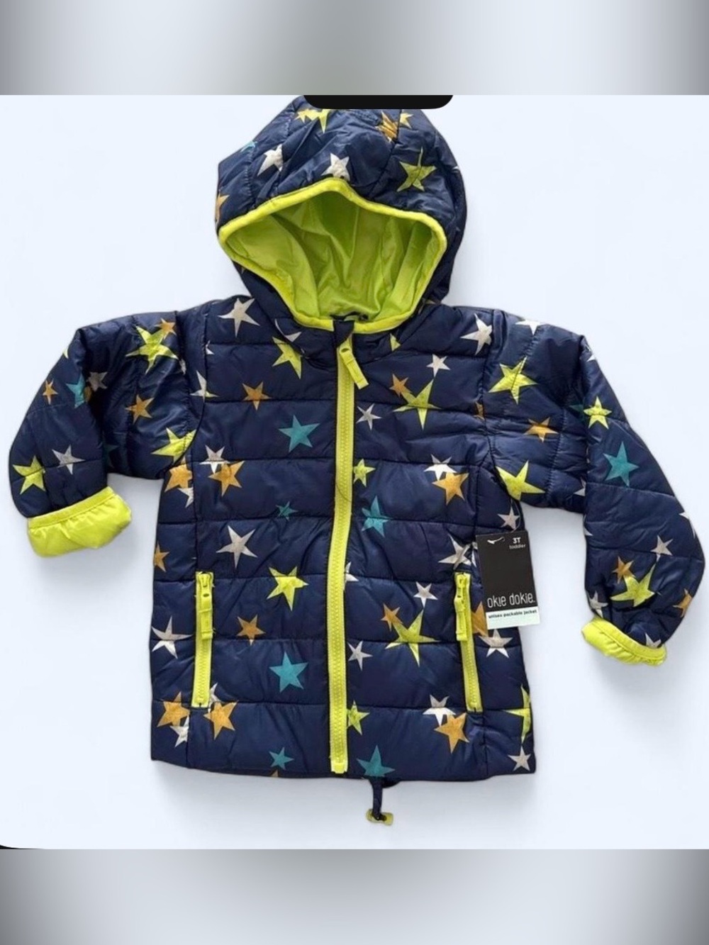 NWT Okie Dokie unisex navy blue puffer jacket with multicolored stars, size 12 m